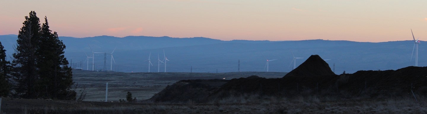 hazy sky with windmills