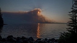 wild fire smoke over water